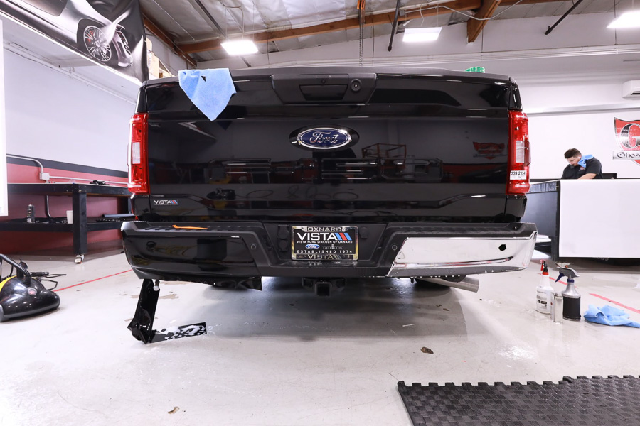 Ghost Shield Film Truck Paint Protection Film Gloss, Satin, Black and White Film. Thousand Oaks, Calabasas, Westlake Village, Camarillo, Oak Park, Agoura Hills White PPF on Chrome Bumper Ford F-150 Rear before and after